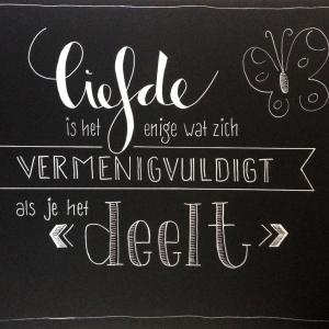 Tekstbord 'Liefde deelt'